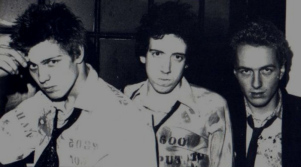 The Clash looking overjoyed at the prospects of a 25 quid wage packet!