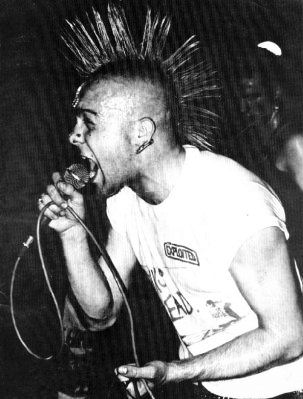 Wattie of the Exploited doin his Dickensian urchin routine (DC Collection)