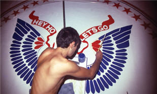 Arturo Vega working on the Ramones backdrop 1978