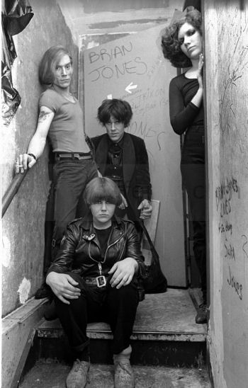 Early Cramps line up '77 - Bryan Gregory, Miriam Linna, Lux Interior, Poison Ivy backstage at CBGB's (DC Collection)