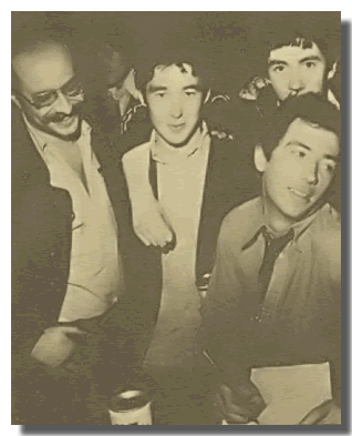 The Buzzcocks and Manager Andrew Lauder sign for UA 1977 (DC Collection)