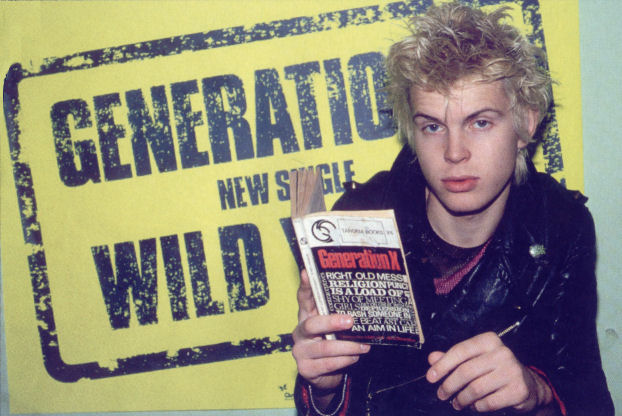 Billy Idol armed with his blueprint bible Xmas 77 (DC Collection)