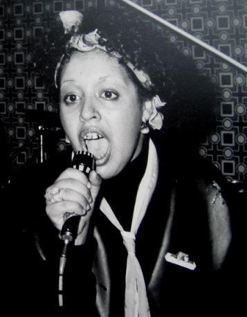 Polly performing at the Red Cow in London 1977